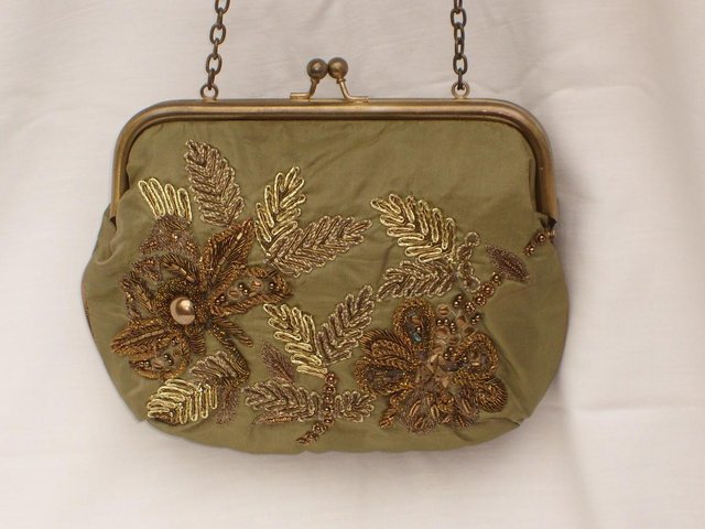 Preview of the first image of ACCESSORIZE Vintage Look Green/Gold Snap Top Handbag.