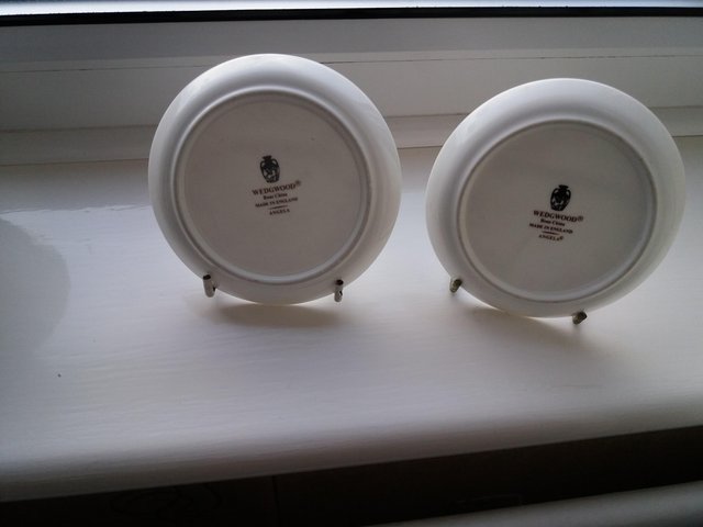 Preview of the first image of Two Wedgwood bone china Angela pattern trinket saucers.