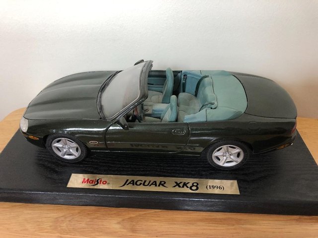 Preview of the first image of Maisto 1:18 scale Jaguar XK8 (1996).