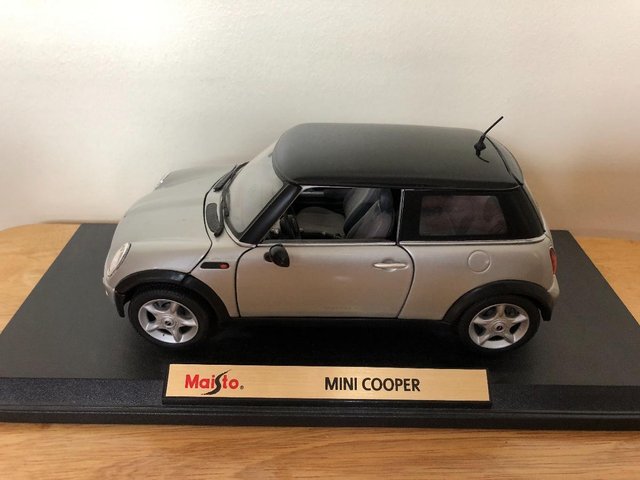 Preview of the first image of Maisto 1:18 scale Silver Mini Cooper.