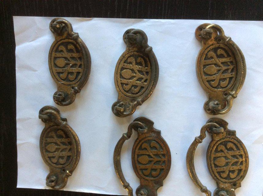 Preview of the first image of Antique brass drawer handles..