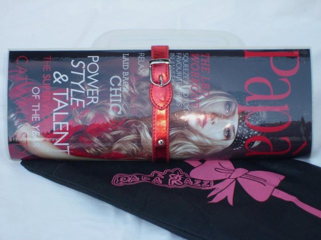 Preview of the first image of PAPARAZZI Magazine Clutch Handbag – NEW.