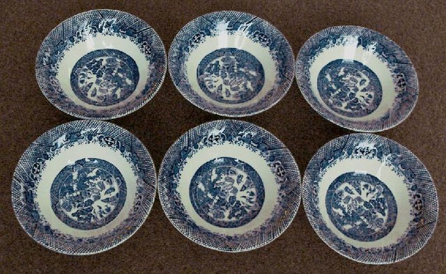 Preview of the first image of 6 Vintage Collectable Blue "Willow" design Cereal Bowls.