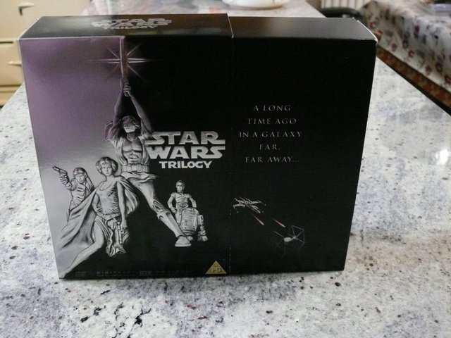 Preview of the first image of Star Wars Trilogy - Box Set 4 Disc Set PG rated.