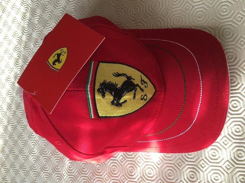 Preview of the first image of ADULT NEW GENUINE RED FERRARI CAP WITH OFFICIAL TAG.