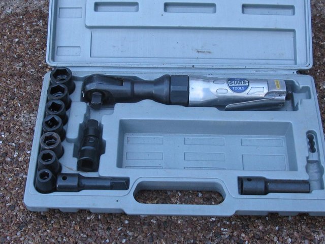 Preview of the first image of 1/2" Reversible Air Ratchet Wrench with Socket Set.