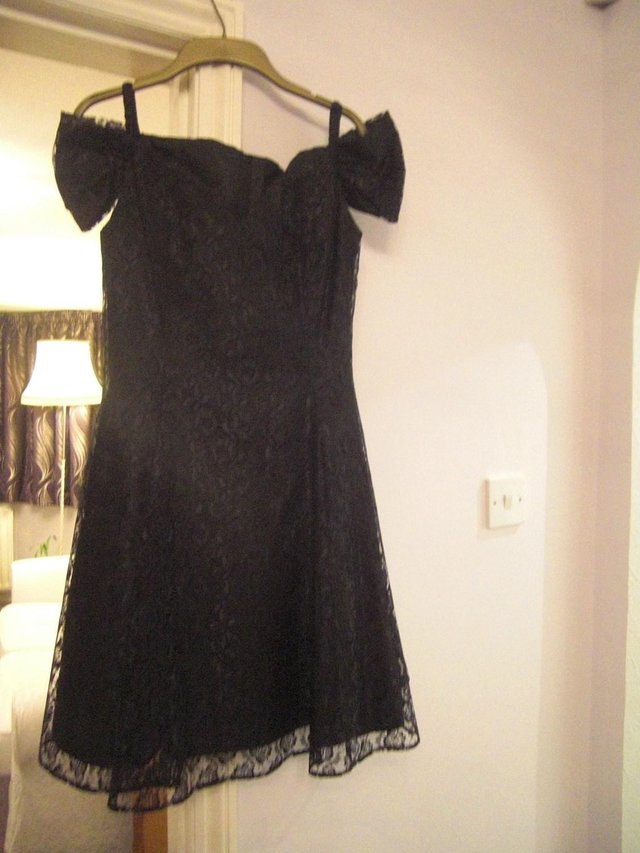 Preview of the first image of Ladies Black Lace Evening Dress.