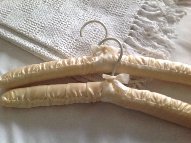 Preview of the first image of 2 SATIN coat hangers.