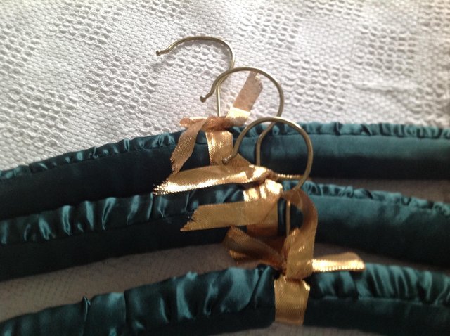 Preview of the first image of 3  SATIN COAT HANGERS.