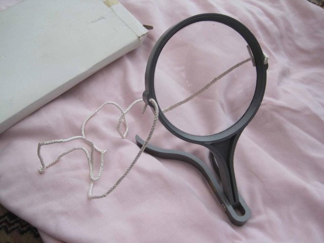 Preview of the first image of magnifying Glass with stand and neck cord.