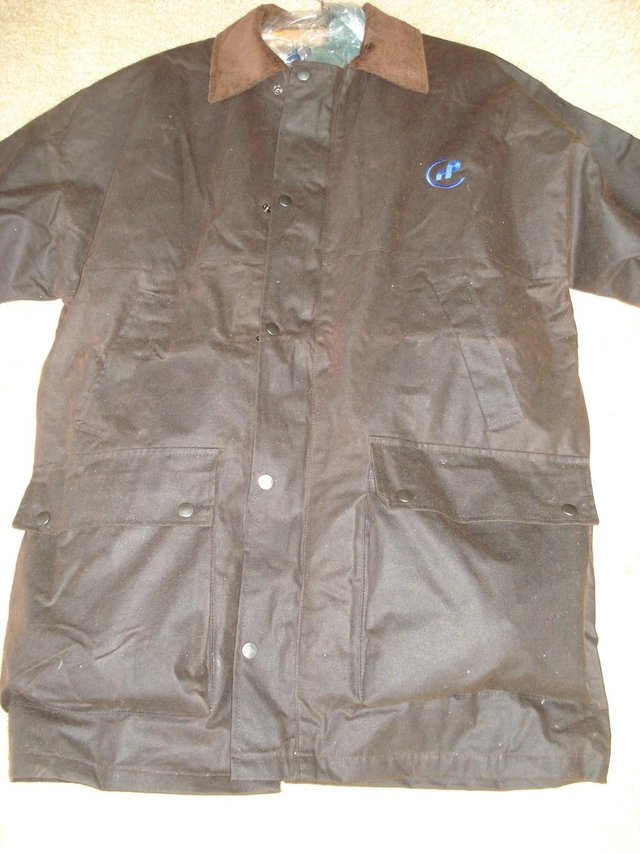 Preview of the first image of NEW HIGH QUALITY DARK BROWN WIND-PROOF WATERPROOF WAX JACKET.