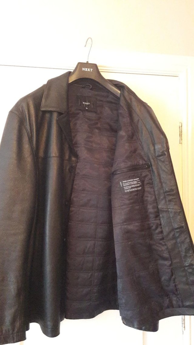 Preview of the first image of Mens dark brown Leather Coat................