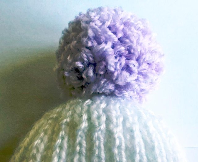 Preview of the first image of Hand Knitted Baby Hat with Pom-Pom - 3-6 months - New.