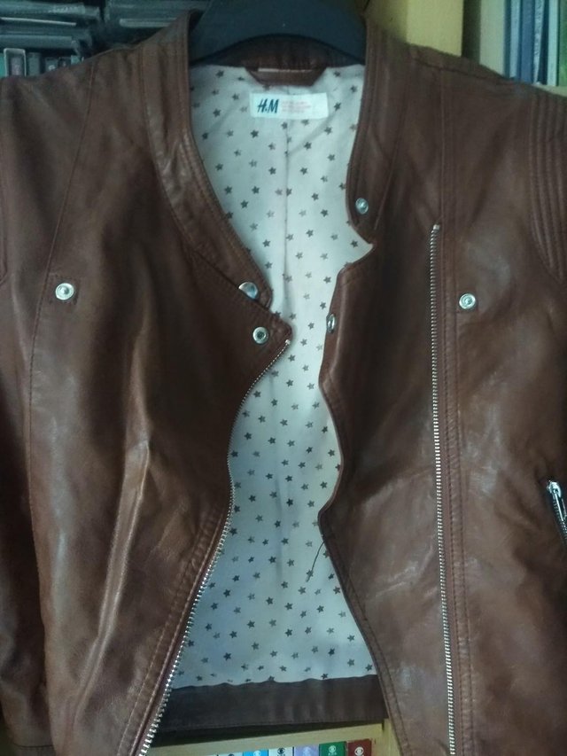 Preview of the first image of Brown New - ( H&M) "biker" leather look jacket. Age 14+.