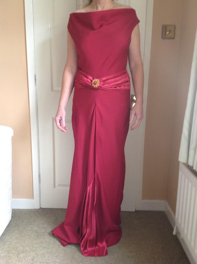 Preview of the first image of Bespoke red long dress, with small train.