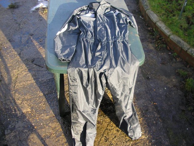Preview of the first image of Leather jacket and Water proof suit.