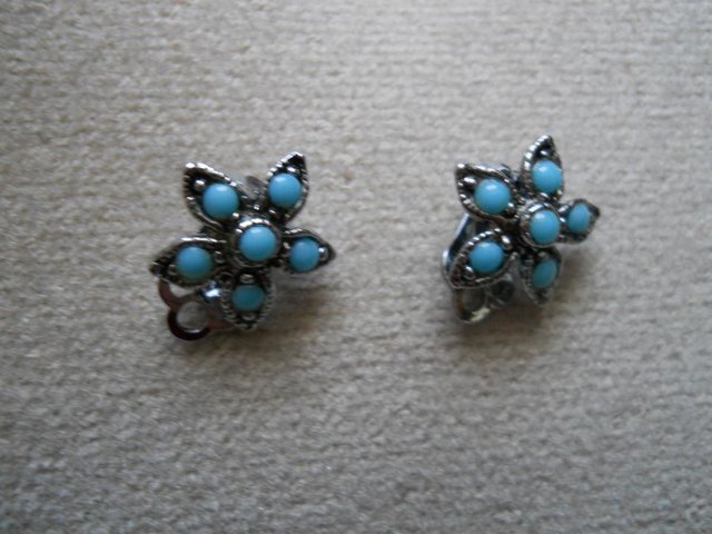 Preview of the first image of Clip on Flower Earings.