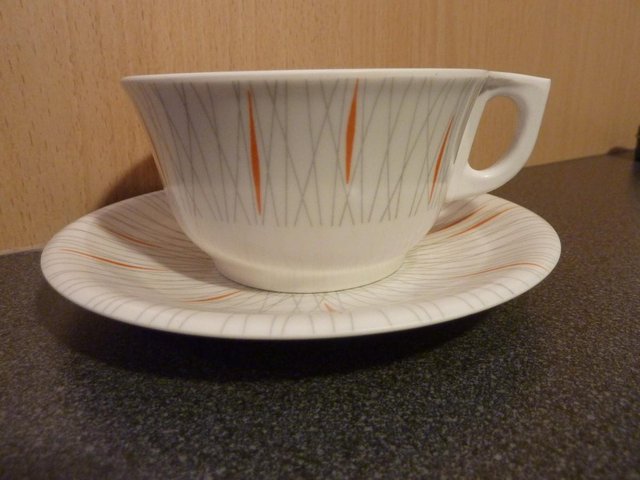 Preview of the first image of NEW 6 Vintage Ornamin Cups and Saucers – 1950’s grey/orange.