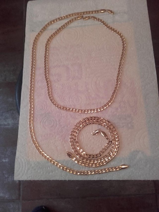 Preview of the first image of 3 gold chains heavy 20 inches, please read description below.
