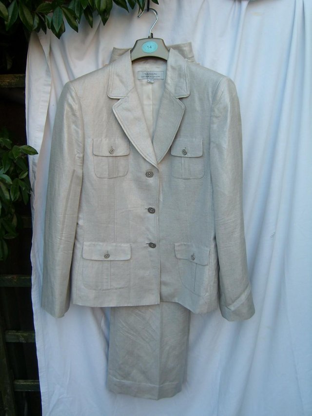 Preview of the first image of ARTHUR S LEVINE TAHARI Silver Trousers/Jacket Size 12/14.