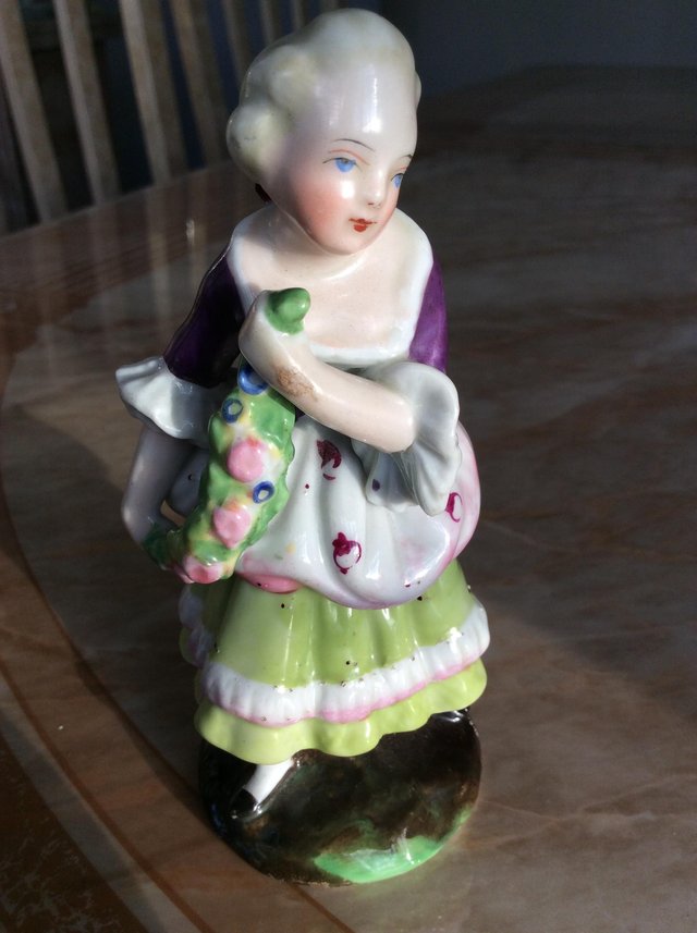 Preview of the first image of Continental porceline figurine of girl.