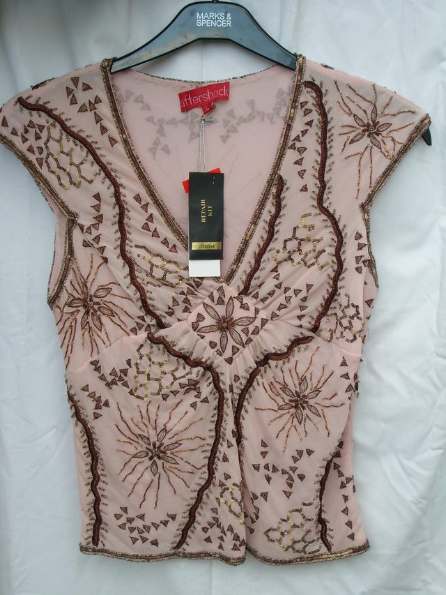 Preview of the first image of AFTERSHOCK Vintage Look Pink Top–Size 12/14(L)–NEW!.