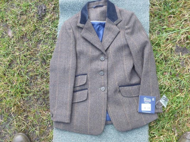 Preview of the first image of New Huntingdon Tweed Jackets.