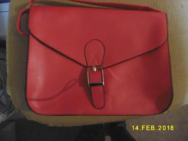 Preview of the first image of Red handbag.