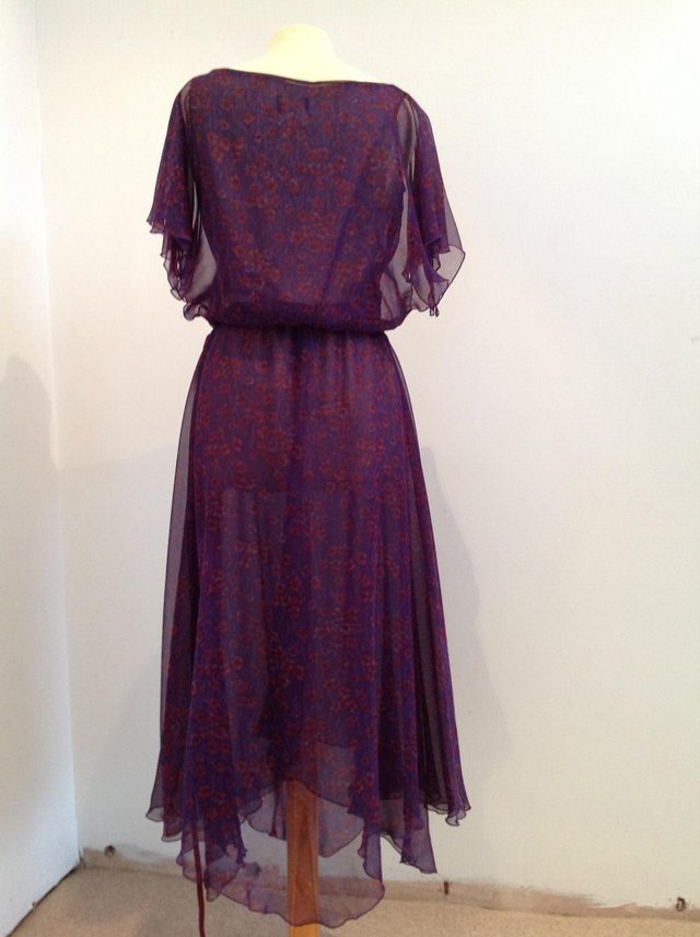 Preview of the first image of Purple Silk dress Vintage 1970s As New.
