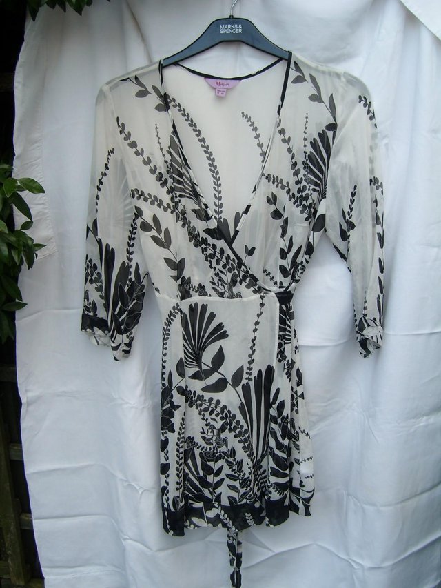 Preview of the first image of MONSOON Black & White Silk Wrap Over Top – Size 14.