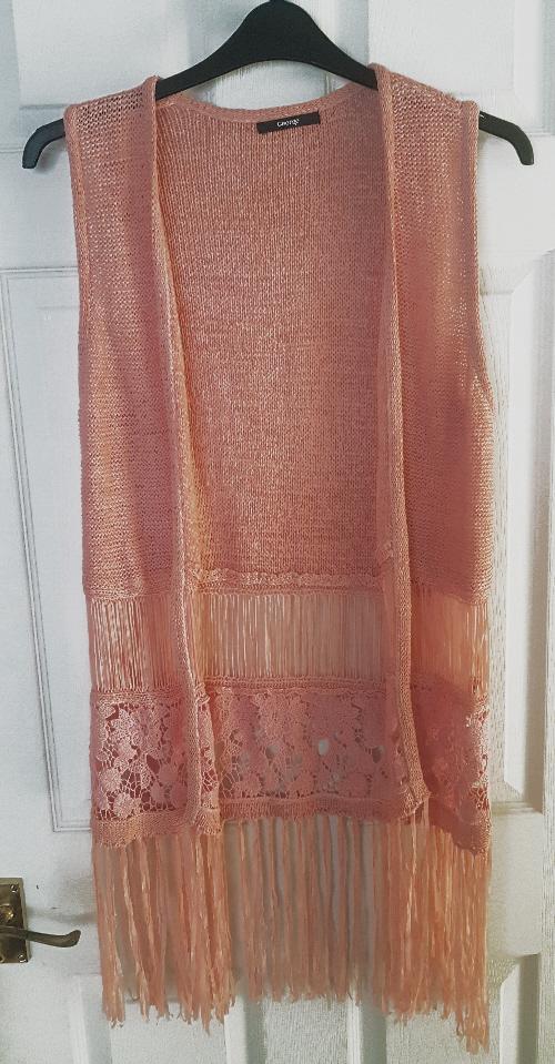 Preview of the first image of Ladies Crochet Boho Style Long tasselled Cardigan By George.