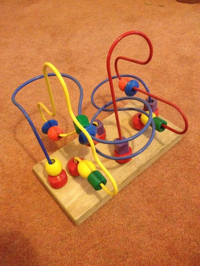 Preview of the first image of Wooden Bead Maze Activity Toy.