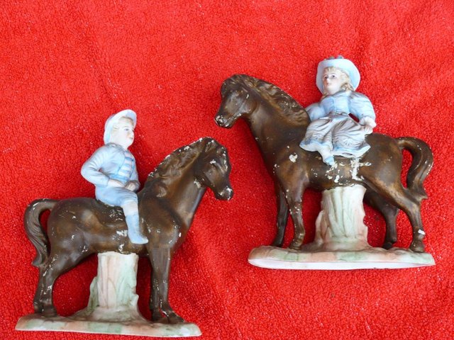 Preview of the first image of 2 Ancient mantle ornaments Boy and Girl separate horses.