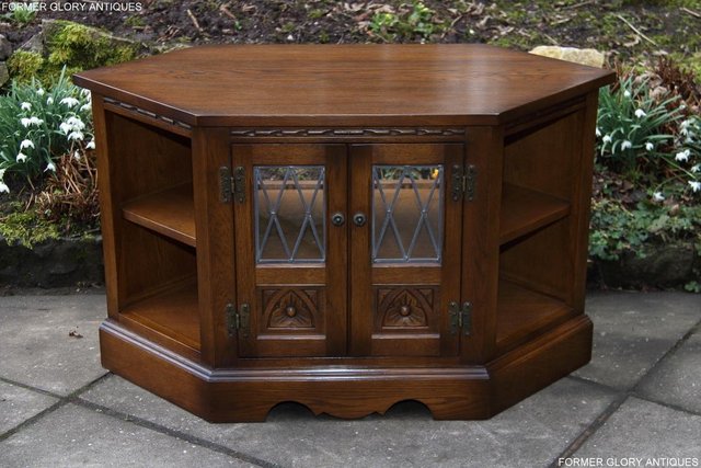 Preview of the first image of AN OLD CHARM LIGHT OAK CORNER TV DVD CD CABINET STAND TABLE.