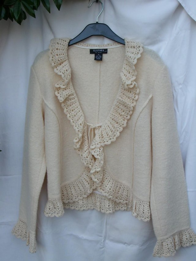 Preview of the first image of CLOTHING BY REVUE Cream Wool Jacket Top – Size 12.