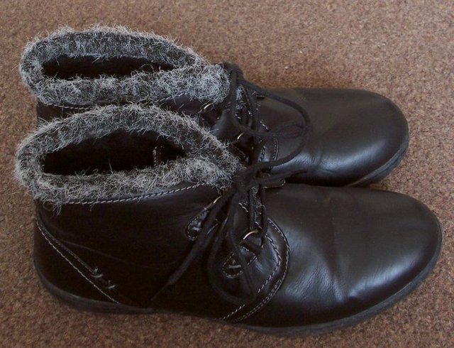 Preview of the first image of Lovely Ladies Black Boots With Grey Fur Trim - Size 5.
