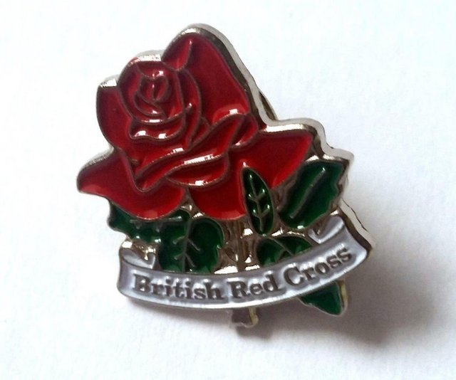 Preview of the first image of British Red Cross Rose enamel badge (Incl P&P).