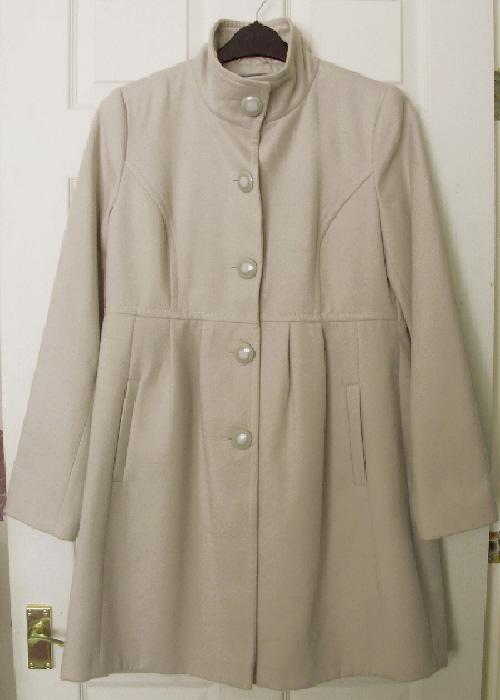 Preview of the first image of Lovely Elegant Ladies Beige Coat By Evie - Size 12.