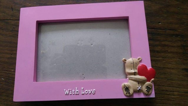 Preview of the first image of Winnie The Pooh Pink Photo Frame.