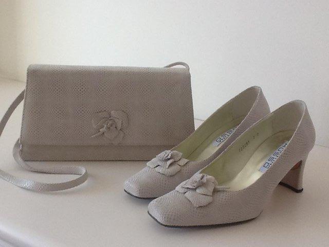 Preview of the first image of SHOES AND HANDBAG.