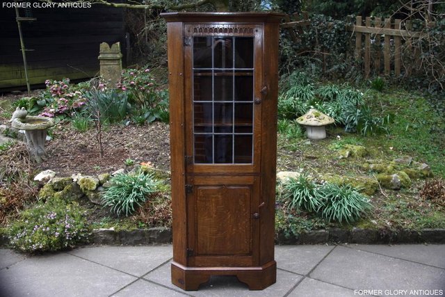 Preview of the first image of NIGEL RUPERT GRIFFITHS OAK CORNER DISPLAY CABINET CUPBOARD.