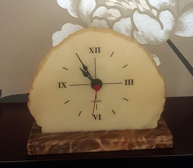 Preview of the first image of Unusual Vintage Battery Operated Clock On Marble Plinth.