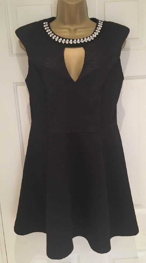 Preview of the first image of River Island Little Black Dress With Gem Neckline - Size 10.