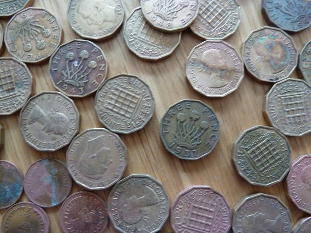 Image 2 of vintage old three pence pieces.