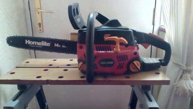 Preview of the first image of Homelite hcs3335 petrol chainsaw.