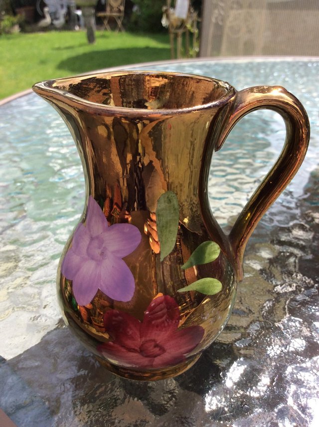 Preview of the first image of Small copper lustre jug.