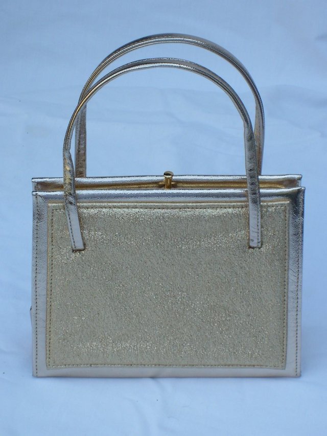 Preview of the first image of ELBIEF ENGLAND Vintage Gold Snap Top Bag.