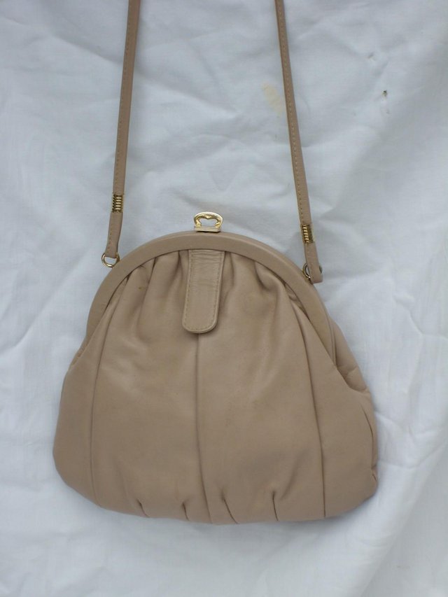 Preview of the first image of MILANO Vintage Beige Leather Snap Top Handbag.