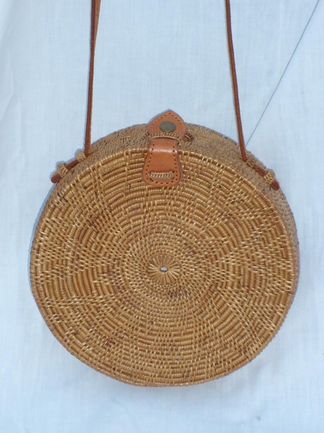 Preview of the first image of Boho Hand Woven Round Handbag NEW.