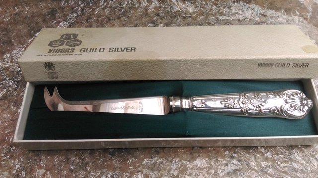 Preview of the first image of Fine Hallmarked Silver antique cheese knife [Boxed].